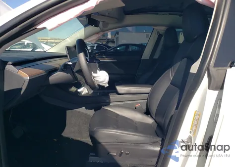 2023 Tesla Model Y из США, поврежденный, VIN 7SAYGAEE0PF686760